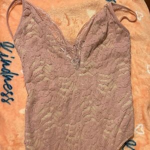 Pink lace bodysuit.